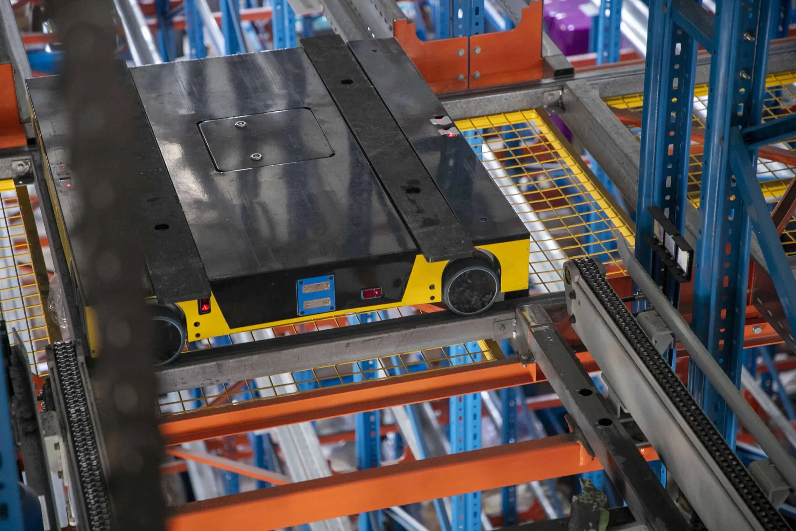 Zikoo Robotics R Bot Smart Four Way Pallet Shuttle Injection Molding Industry Shelf To Person6 Scaled Zikoo Robotics R Bot Smart Four Way Pallet Shuttle Injection Molding Industry Shelf To Person6 Scaled