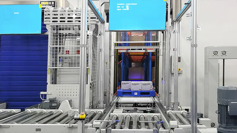 Four-way shuttle moving pallets inside high-density racking system
